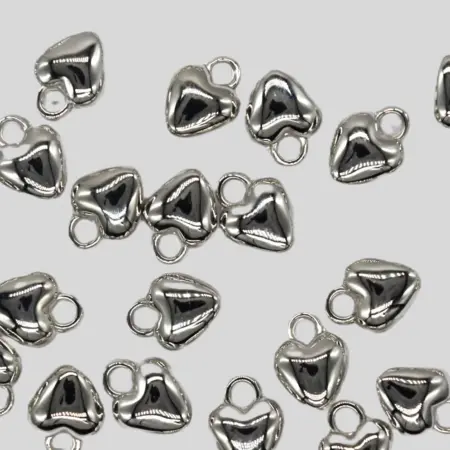 Мънисто сърце 12х9.5х5 мм.